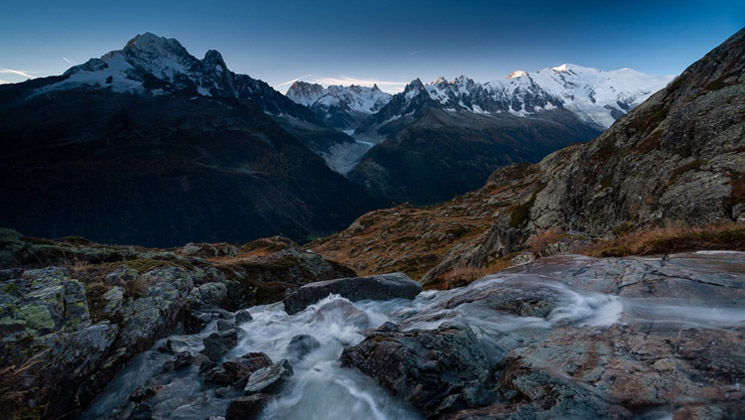 mont blanc surrounded by rocks river