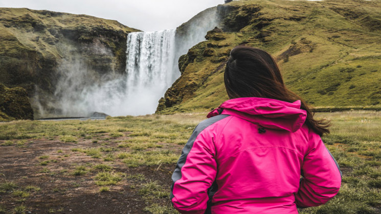 traveler travel skogafoss waterfall Iceland